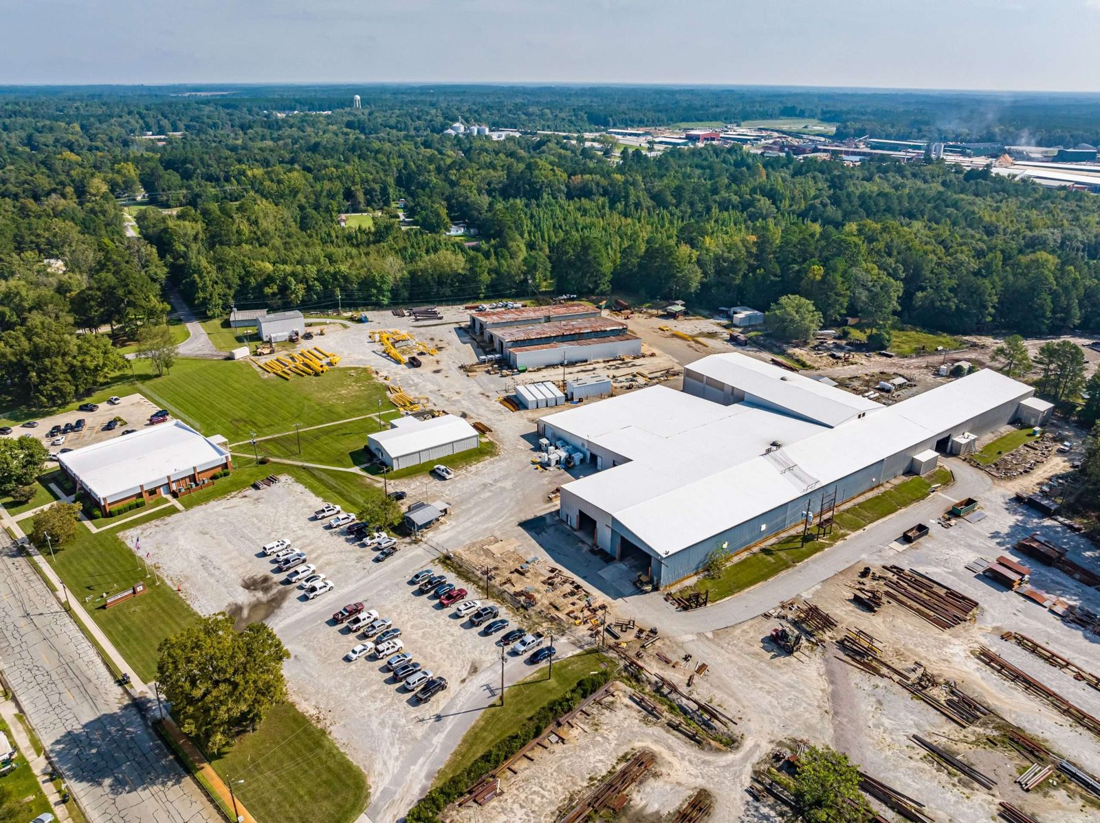 Aerial of a warehouse and logistics facility re-roofed with single-ply TPO by RPI Roofing near Savannah, GA